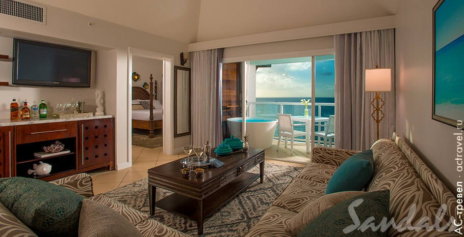 Номер Sunset Bluff Penthouse Oceanview One Bedroom Butler Suite with Balcony Tranquility Soaking Tub в отеле Sandals Regency La Toc